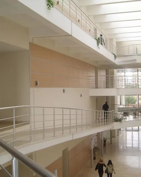 Ceramic flooring installation on tiered lecture platform