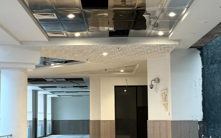 Multi-tier atrium circulation galleries and column cladding